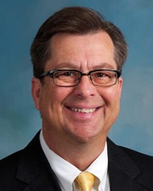 Headshot of Stephen Radau
