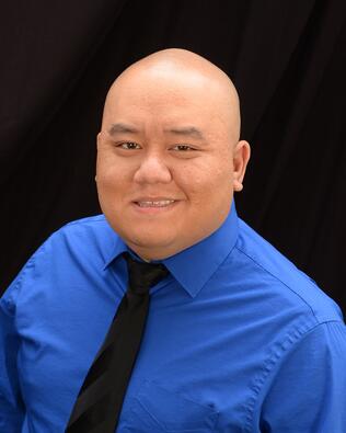Headshot of Stephen Kue