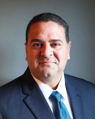 Headshot of Ernesto Muniz