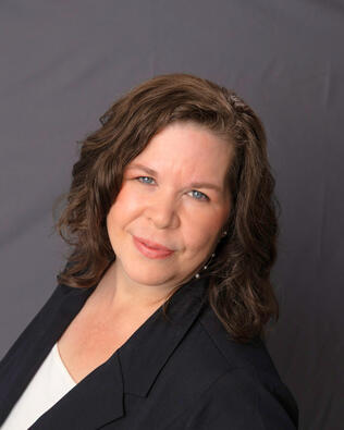 Headshot of Poppy Nottage