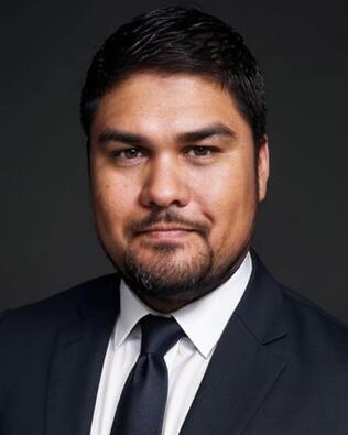 Headshot of Christopher De La Rosa