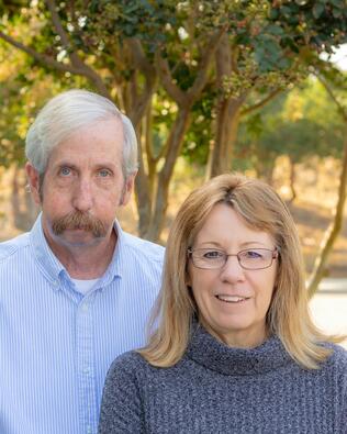 Headshot of Mike and Lu Syrett