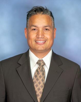 Headshot of Manuel Ultrera