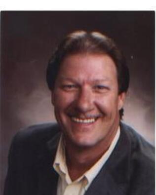 Headshot of Raymond Armstrong