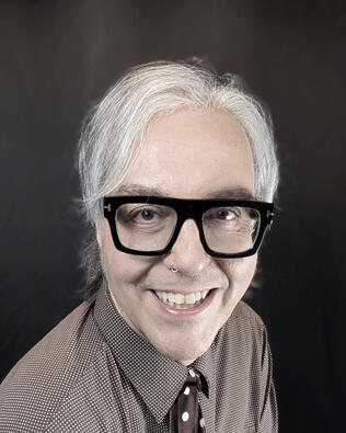 Headshot of Justin J. DuPre