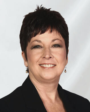 Headshot of Kelly Delgado