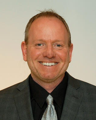 Headshot of Michael Adams