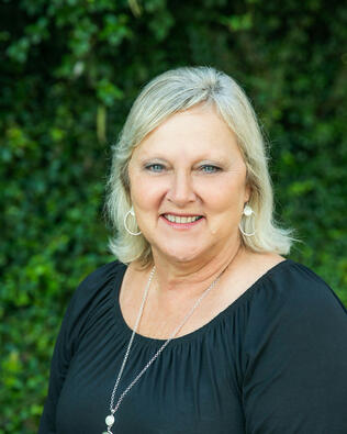 Headshot of Marcia Love