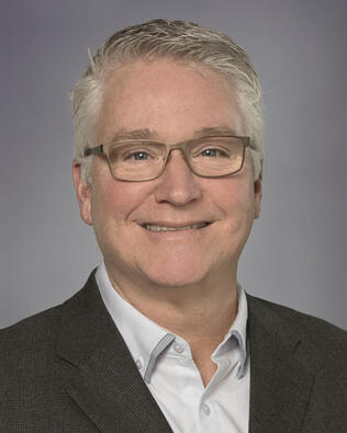 Headshot of James Perry