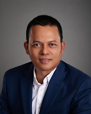 Headshot of Pau Suan