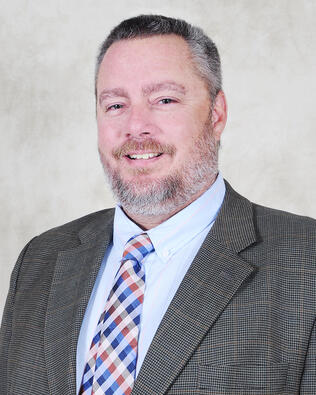 Headshot of Chad  Ellis