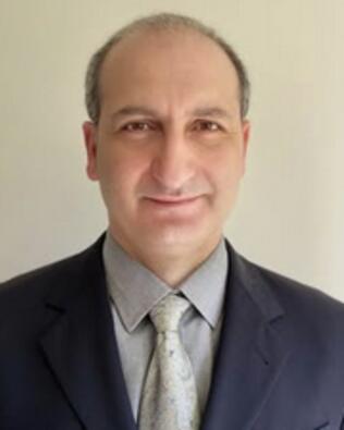Headshot of Esat Albulut