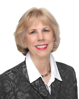 Headshot of Carol Mundell