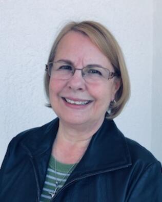 Headshot of Lourdes Materno