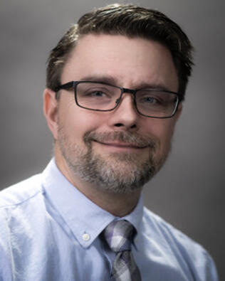 Headshot of Timothy Card