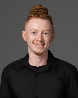 Headshot of Tayler Speckner