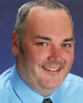 Headshot of Benjamin Corcoran