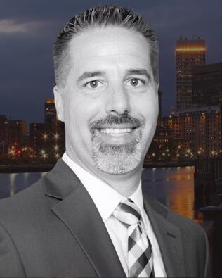 Headshot of Glen Reichard