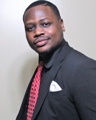 Headshot of Aderemi Adigun