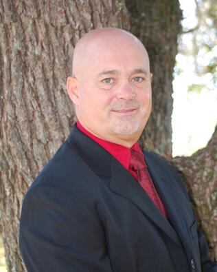 Headshot of Teddy Hucks