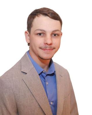 Headshot of Ty Genzer