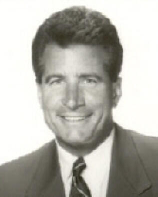 Headshot of Gregory Adamson