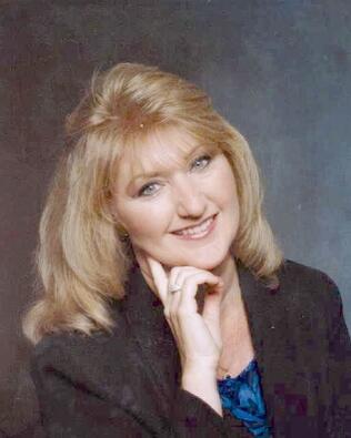 Headshot of Cathy Grelle