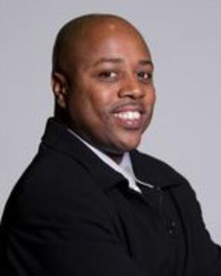 Headshot of Reginald Butler, Jr.