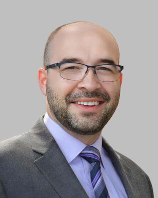 Headshot of Justin Ashton