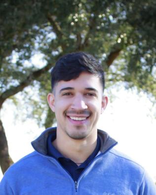 Headshot of Manuel Veloz