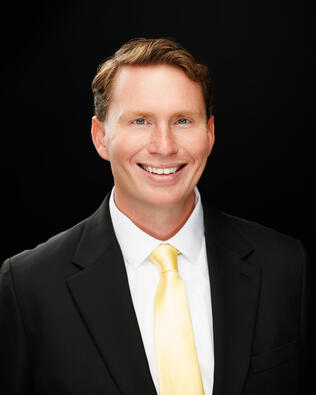 Headshot of Isaac Hudgins