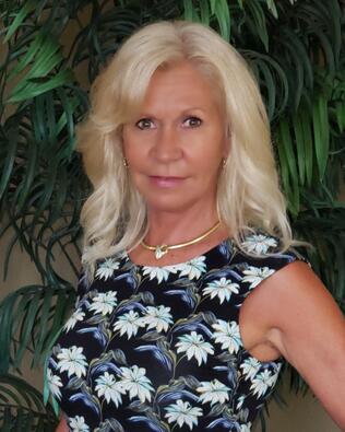 Headshot of Ann Combs