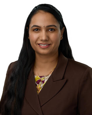 Headshot of Amrita Rai