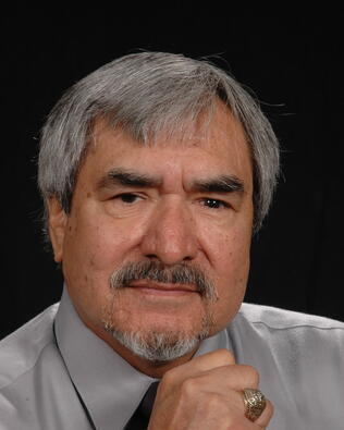 Headshot of Toby Cisneroz