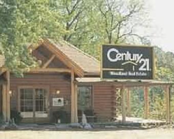 Photo depicting the building for CENTURY 21 Woodland Real Estate