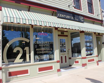 Photo depicting the building for CENTURY 21 New Heritage
