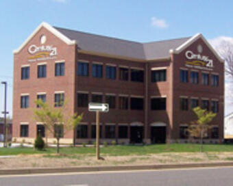 Photo depicting the building for CENTURY 21 New Millennium