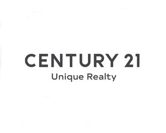 Photo depicting the building for CENTURY 21 Unique Realty