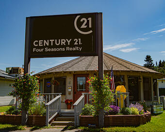 Photo depicting the building for CENTURY 21 Four Seasons Realty