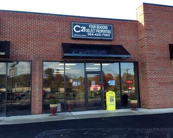 Photo depicting the building for CENTURY 21 Four Seasons Select Properties