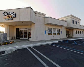 Photo depicting the building for CENTURY 21 Desert Rock