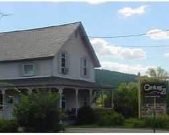 Photo depicting the building for CENTURY 21 Adirondacks