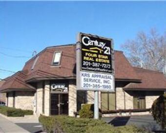 Photo depicting the building for CENTURY 21 Four Star Real Estate