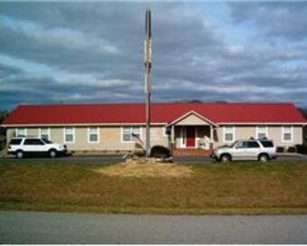 Photo depicting the building for CENTURY 21 Howe Realty & Auction