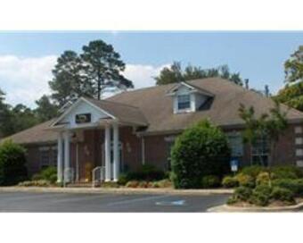 Photo depicting the building for CENTURY 21 Hill Minger Agency