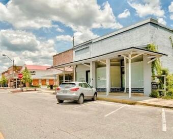 Photo depicting the building for CENTURY 21 Blue Marlin Pelican