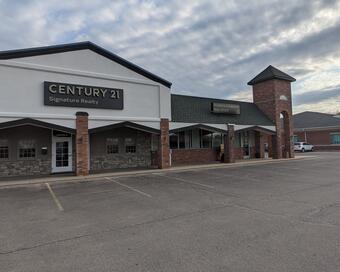 Photo depicting the building for CENTURY 21 Signature Realty