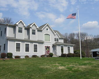 Photo depicting the building for CENTURY 21 Van Syckel ~ Golden Post