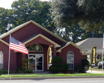 Photo depicting the building for CENTURY 21 Landmark Associates